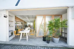 "A picture of an Archtecture Office in Japan that opens directly onto the street at ground level."